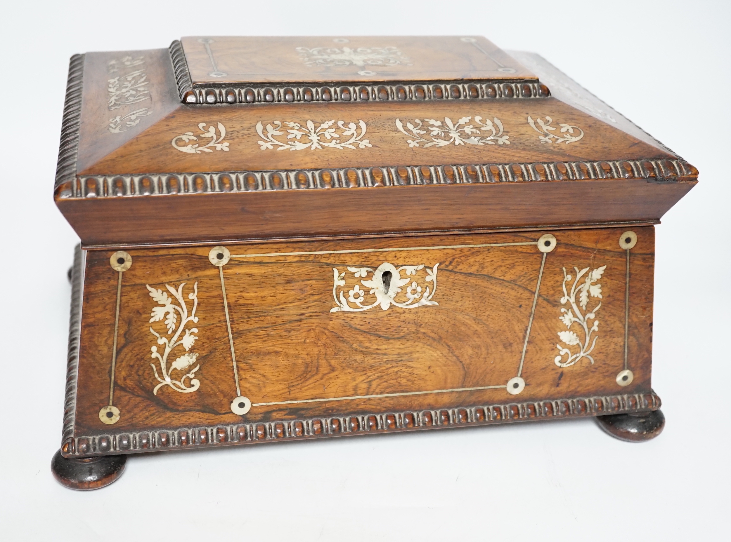 A William IV mother of pearl inlaid rosewood jewellery casket, 30cm wide